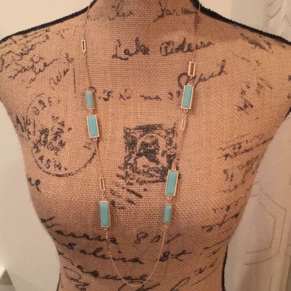 Gold and turquoise colored necklace
